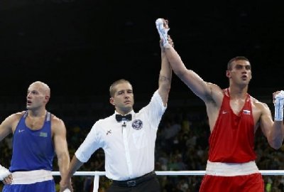 Первое олимпийское золото России в боксе принес Евгений Тищенко 